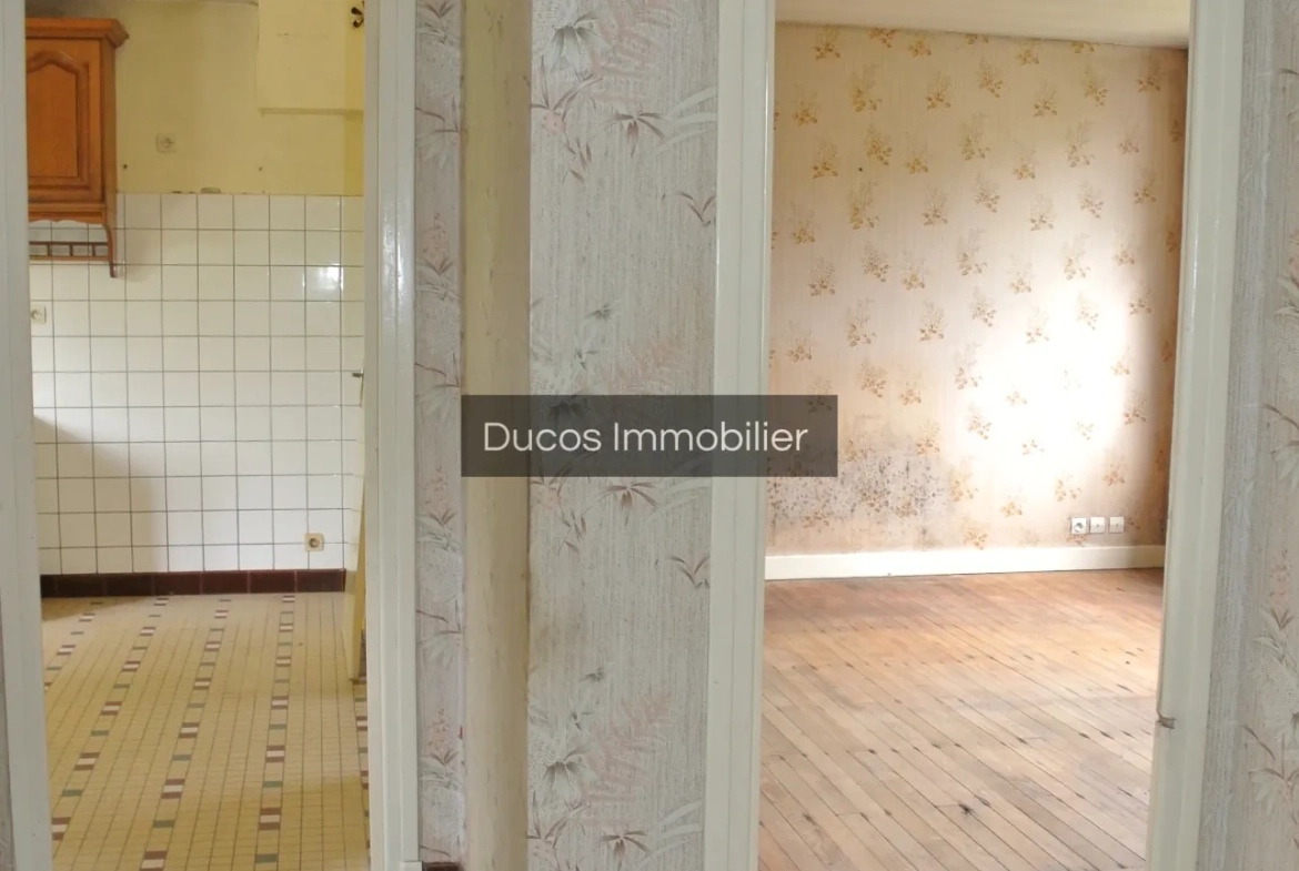 Maison à rénover avec jardin et garage à Marmande 