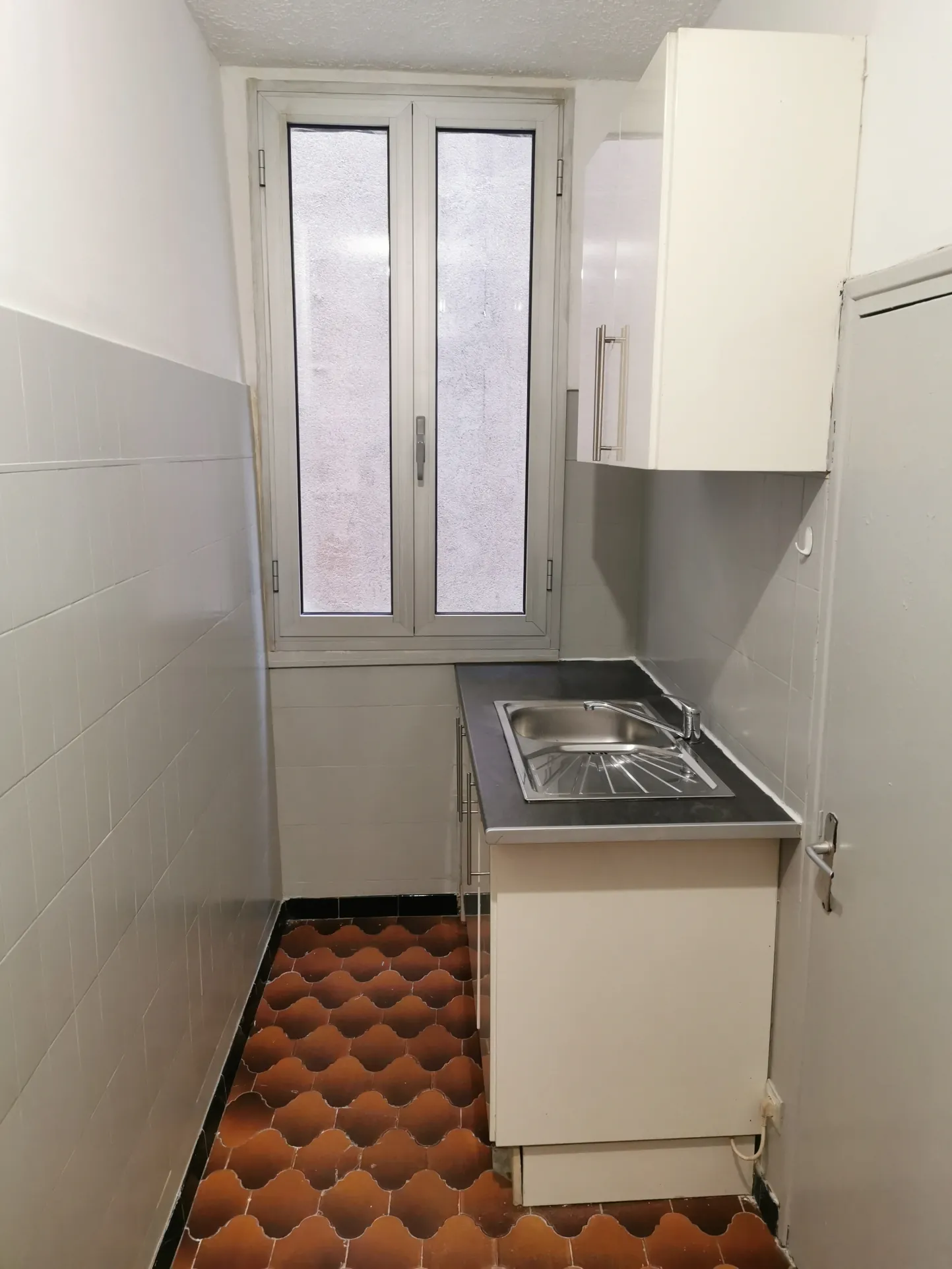 Investissement locatif à Lodève : T1 loué avec cave dans rue piétonne 