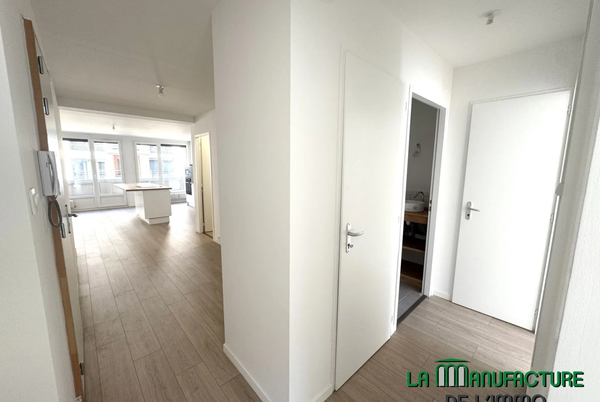Appartement T3 rénové avec balcon, cave et garage à Saint-Étienne - Cité du design 
