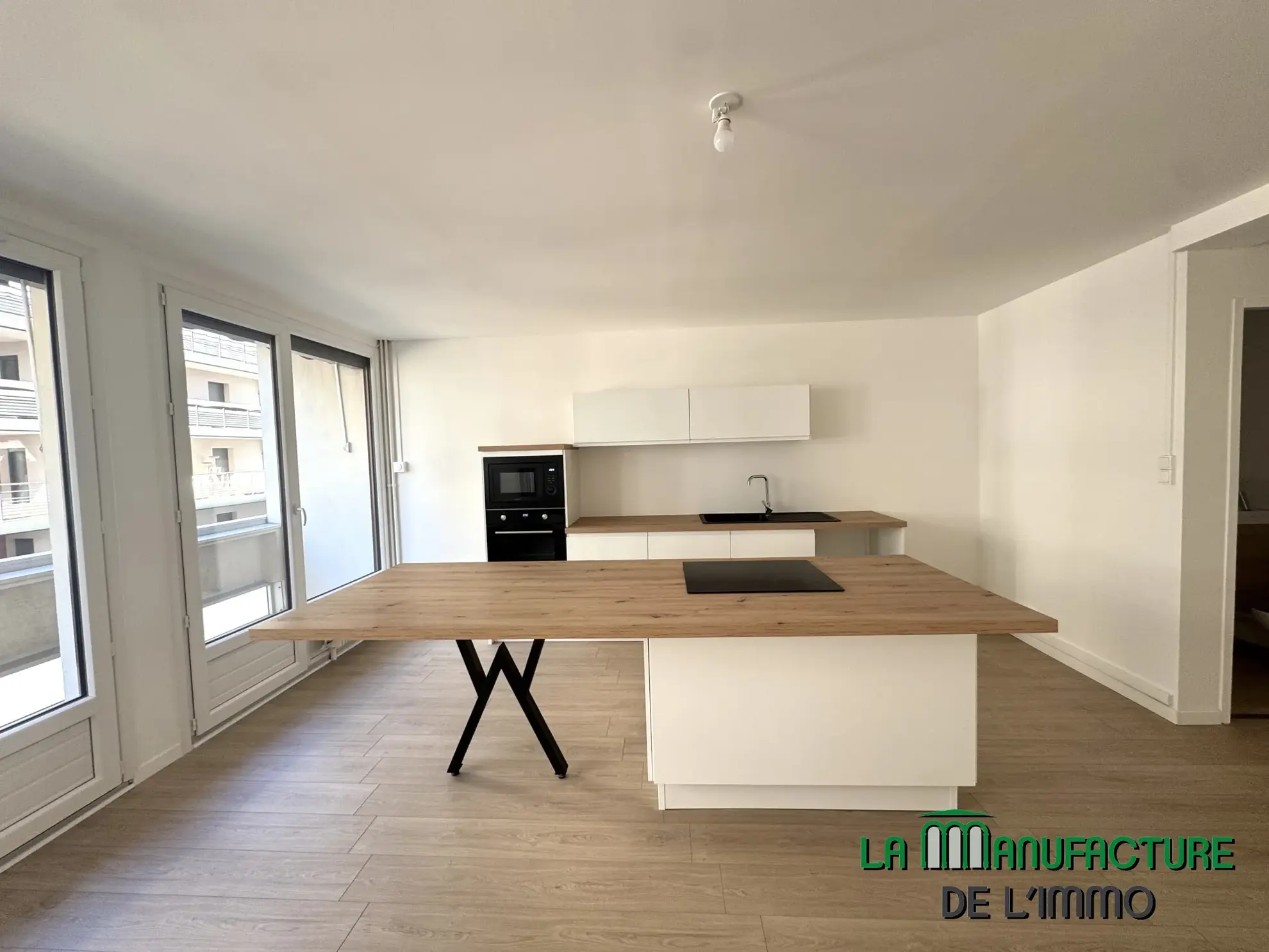 Appartement T3 rénové avec balcon, cave et garage à Saint-Étienne - Cité du design 