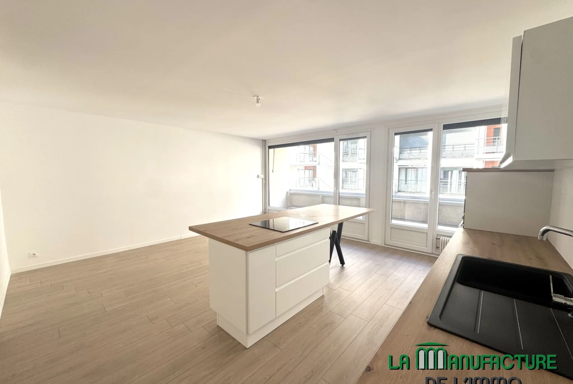 Appartement T3 rénové avec balcon, cave et garage à Saint-Étienne - Cité du design 