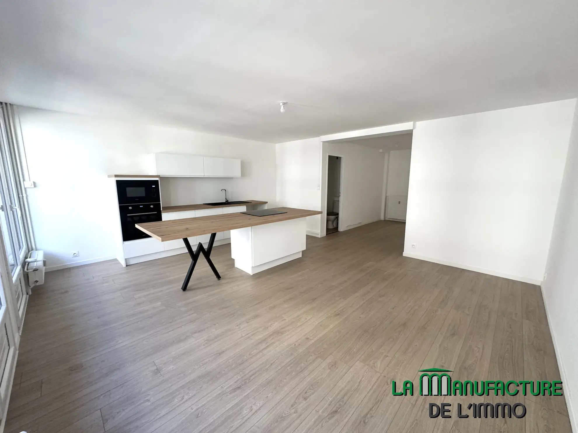 Appartement T3 rénové avec balcon, cave et garage à Saint-Étienne - Cité du design 