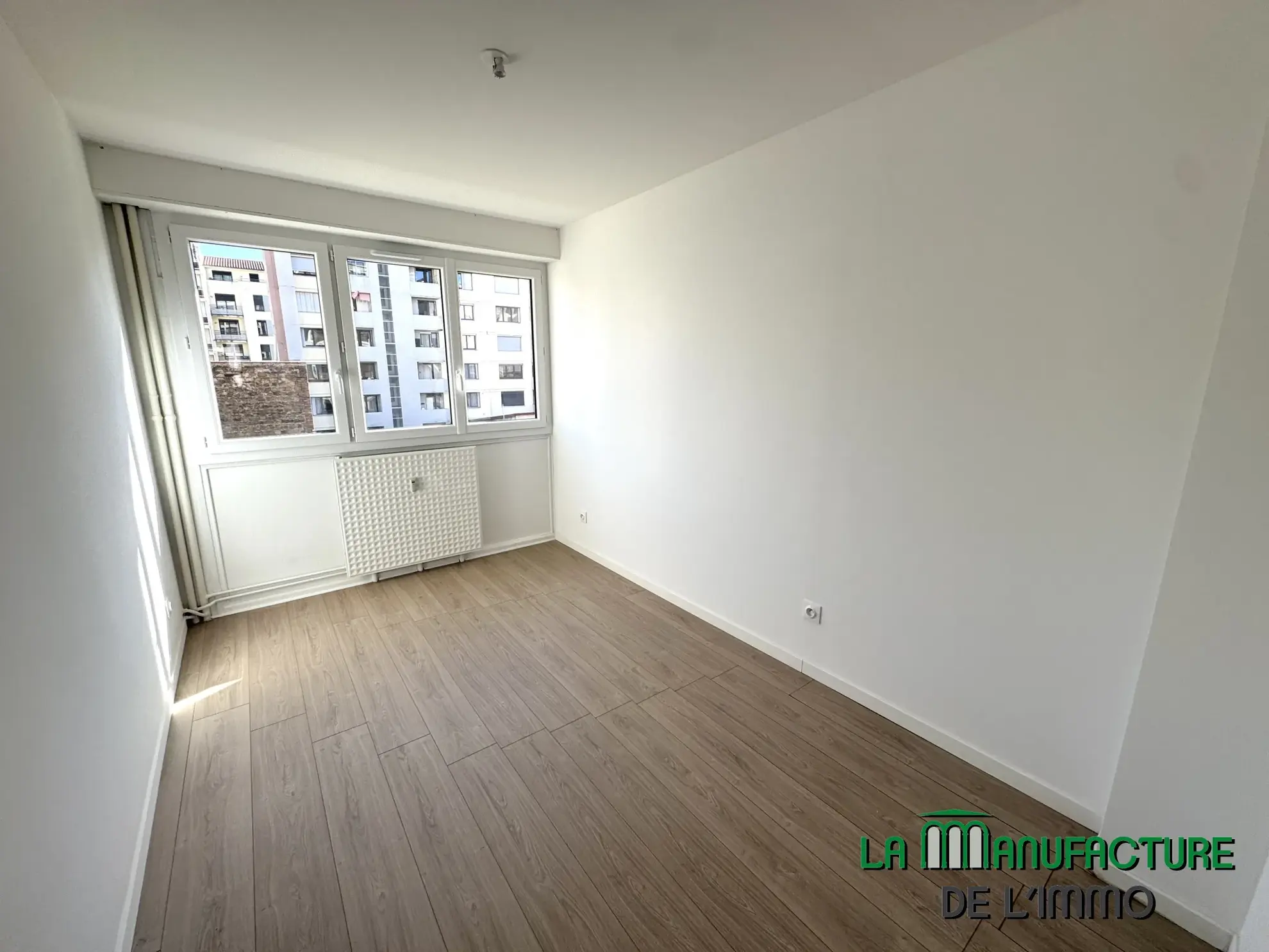 Appartement T3 rénové avec balcon, cave et garage à Saint-Étienne - Cité du design 