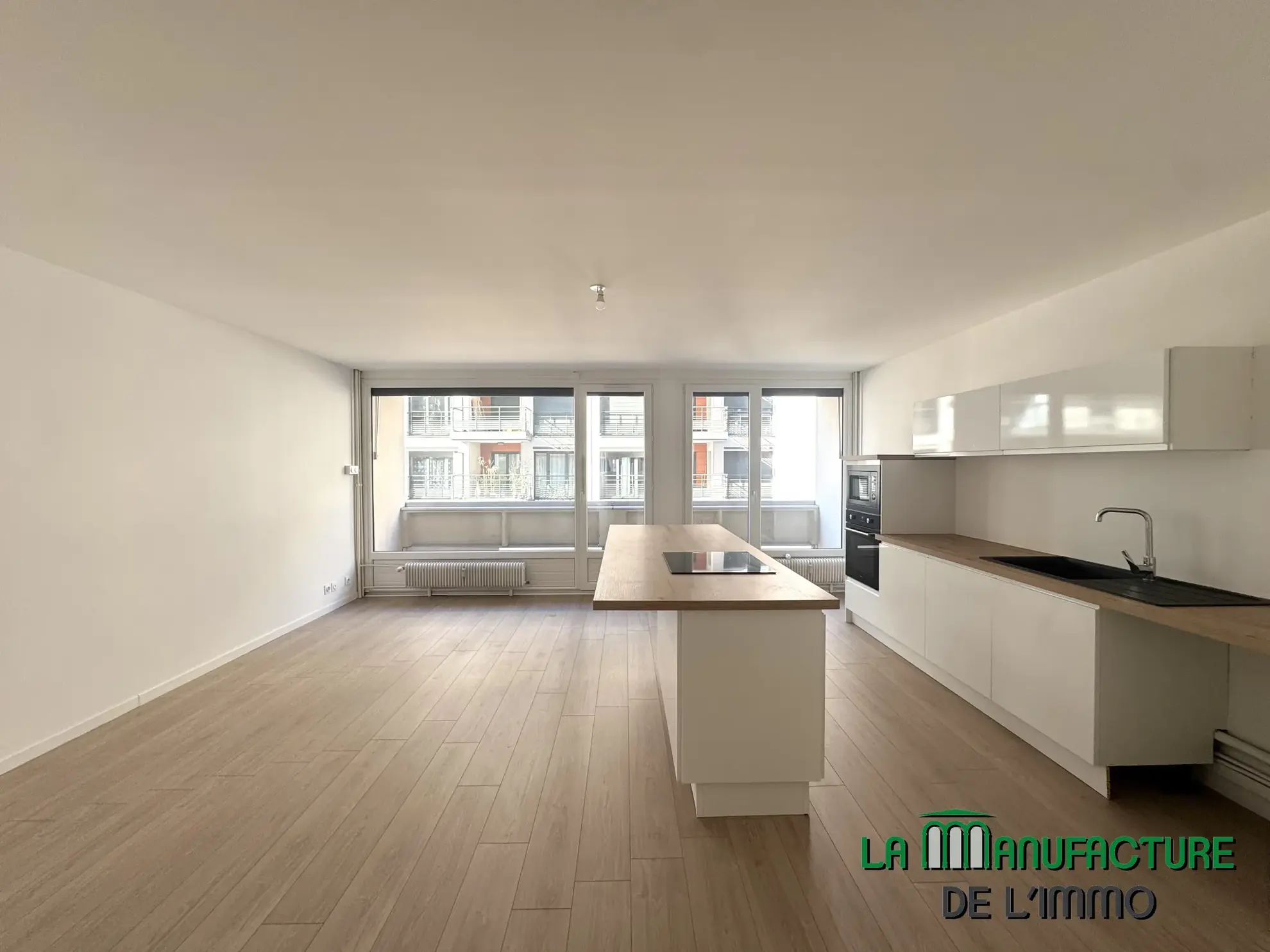 Appartement T3 rénové avec balcon, cave et garage à Saint-Étienne - Cité du design 