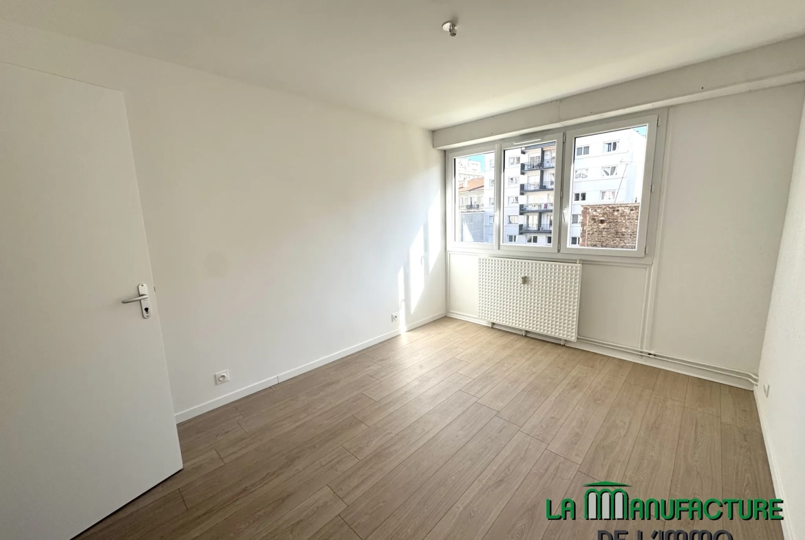 Appartement T3 rénové avec balcon, cave et garage à Saint-Étienne - Cité du design 