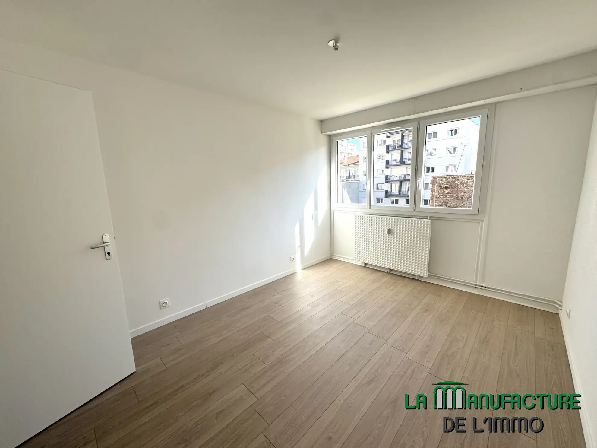 Appartement T3 rénové avec balcon, cave et garage à Saint-Étienne - Cité du design 