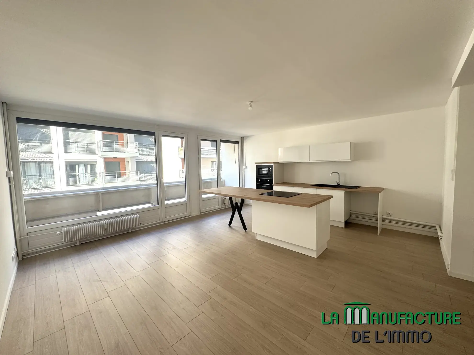 Appartement T3 rénové avec balcon, cave et garage à Saint-Étienne - Cité du design 