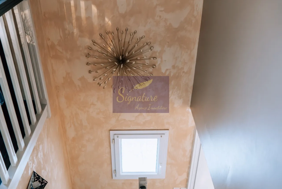 Maison familiale de 127 m² à Louplande avec 4 chambres et terrasse 