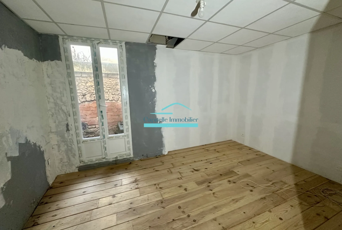 Achat appartement T4 en rez-de-chaussée avec cour et cave à Lodève 