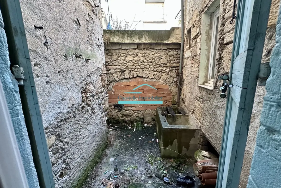 Achat appartement T4 en rez-de-chaussée avec cour et cave à Lodève 
