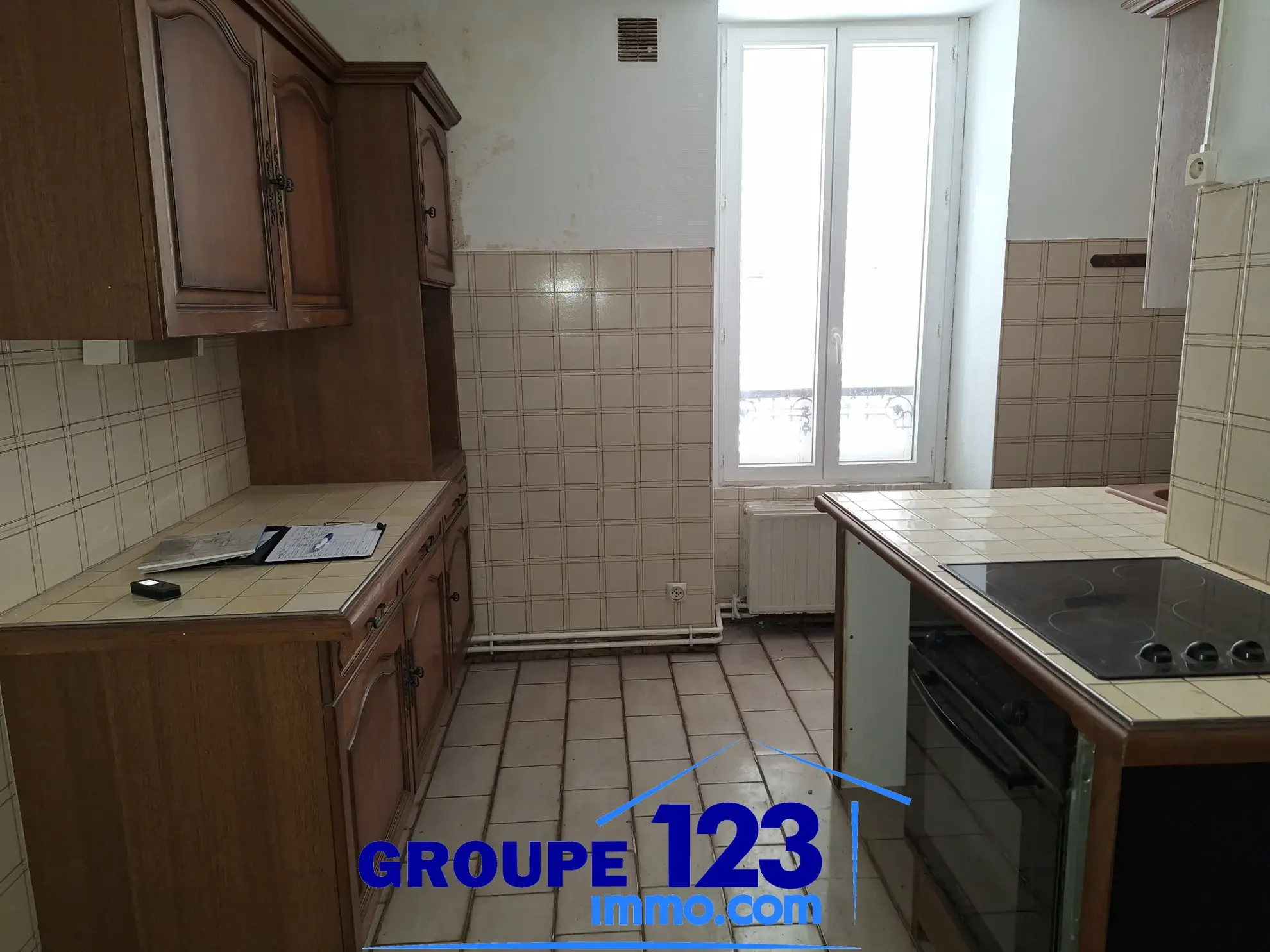 Ensemble immobilier à vendre au cœur de l'Isle-sur-Serein (89) avec maison et local commercial 