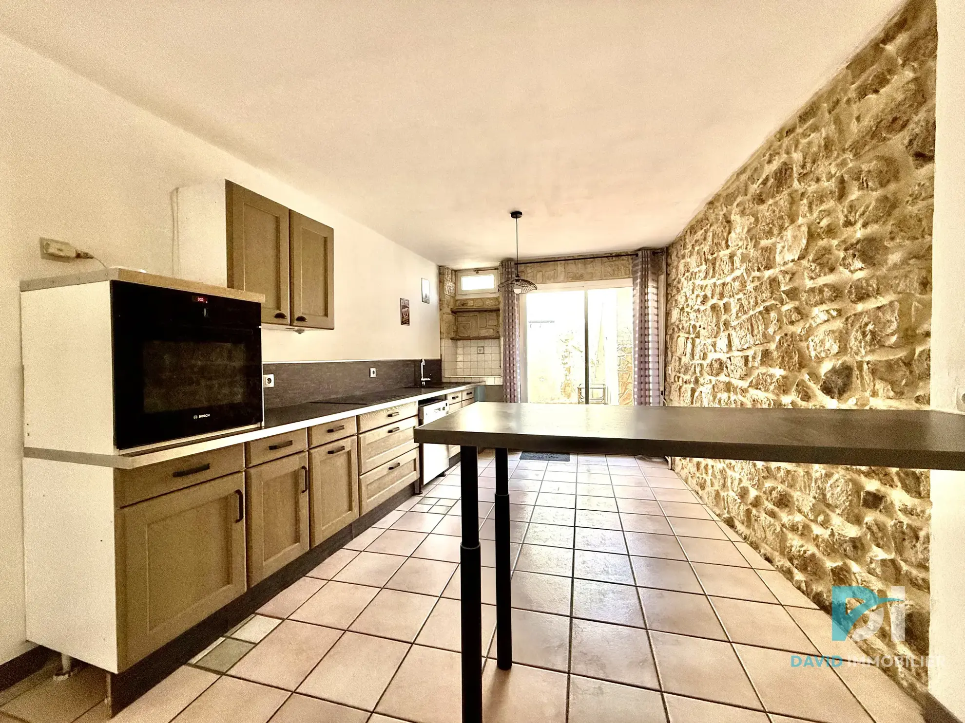 Maison de village rénovée de 91 m² avec garage et terrasse à Florensac 