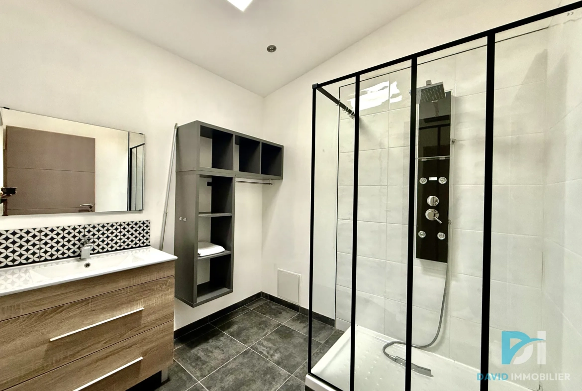 Maison de village rénovée de 91 m² avec garage et terrasse à Florensac 