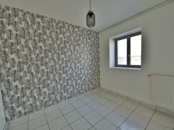Maison à vendre au centre-ville d'Arsonval, 117 m² avec garage et 2 chambres à Brive-la-Gaillarde 