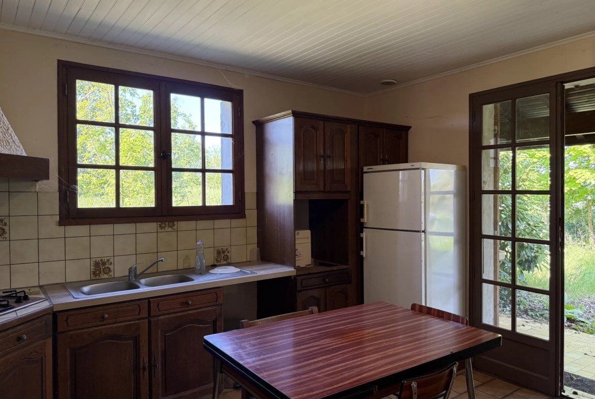 Maison de hameau de 206 m² avec dépendances et terrain arboré près de Larroque-sur-losse 