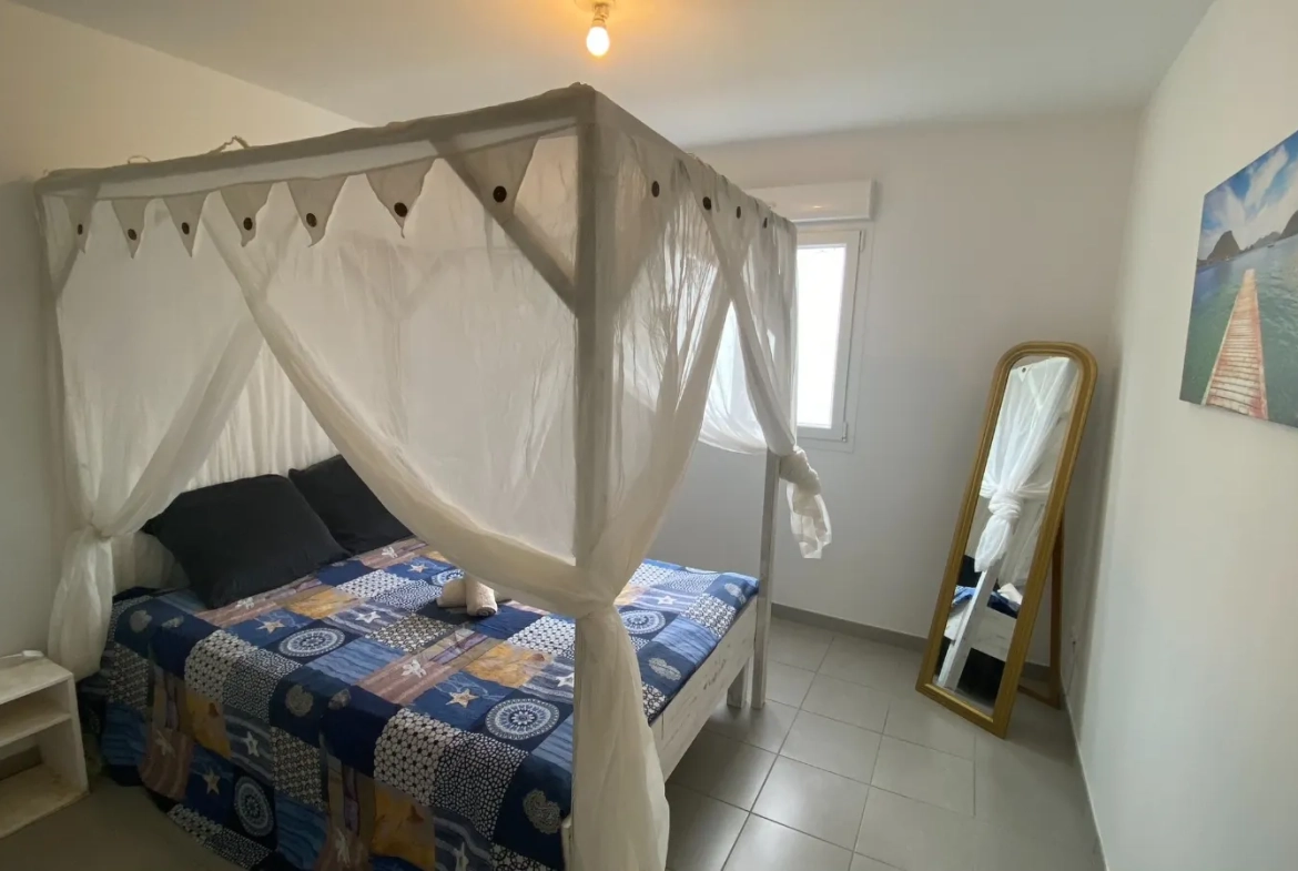 Appartement T3 avec terrasse, vue mer, à vendre à Les Trois-Ilets 