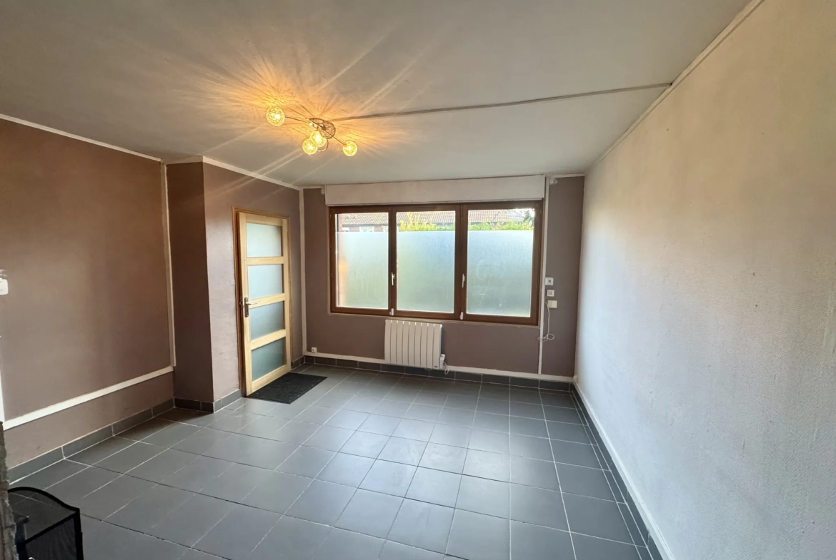 Maison 3 chambres à vendre à Tourcoing – 66m2 avec jardin et rénovations récentes 