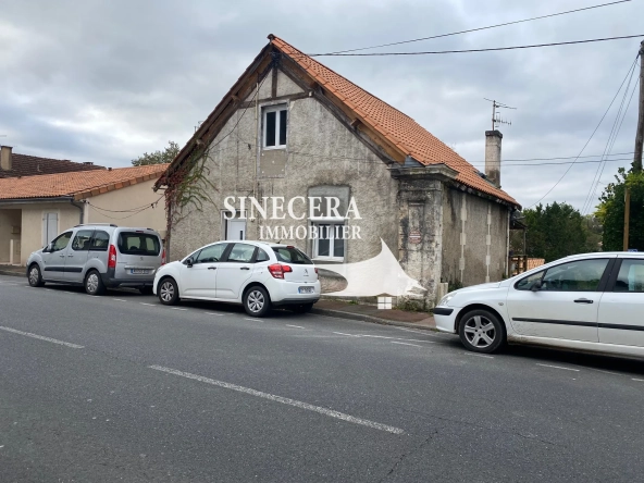 Charmante maison de ville avec terrain à Riberac, proche des commodités 