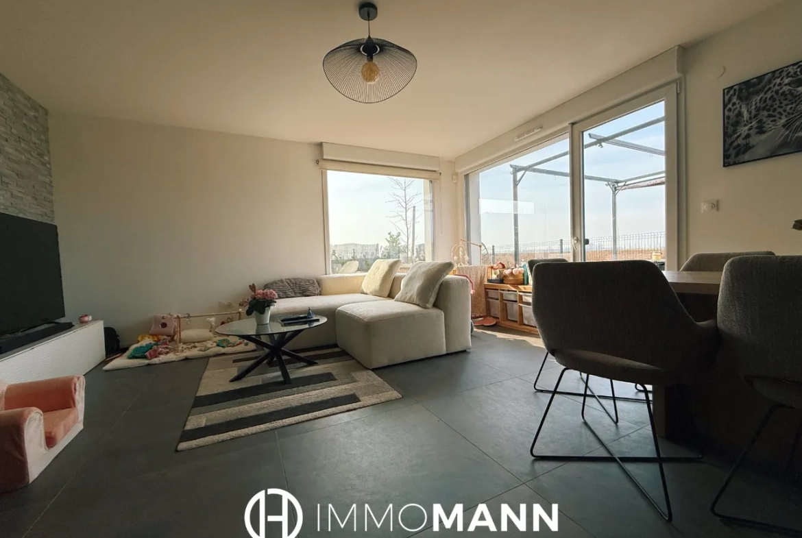 Superbe appartement en rez-de-jardin à Entzheim avec jardin privé de 129 m2 