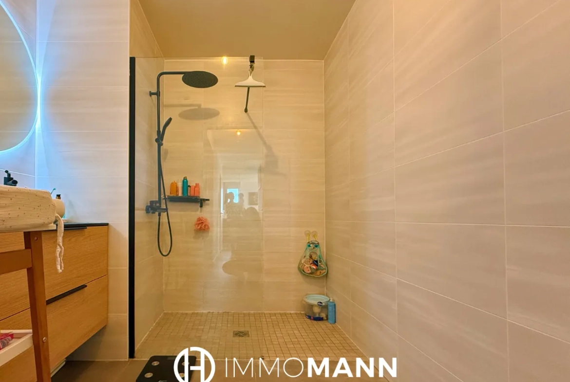 Superbe appartement en rez-de-jardin à Entzheim avec jardin privé de 129 m2 