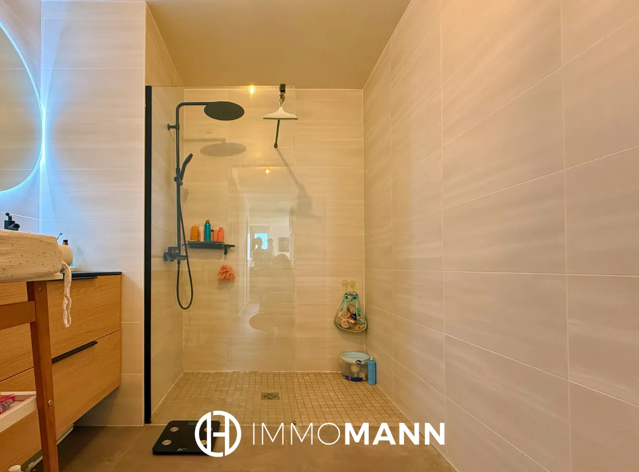 Superbe appartement en rez-de-jardin à Entzheim avec jardin privé de 129 m2 