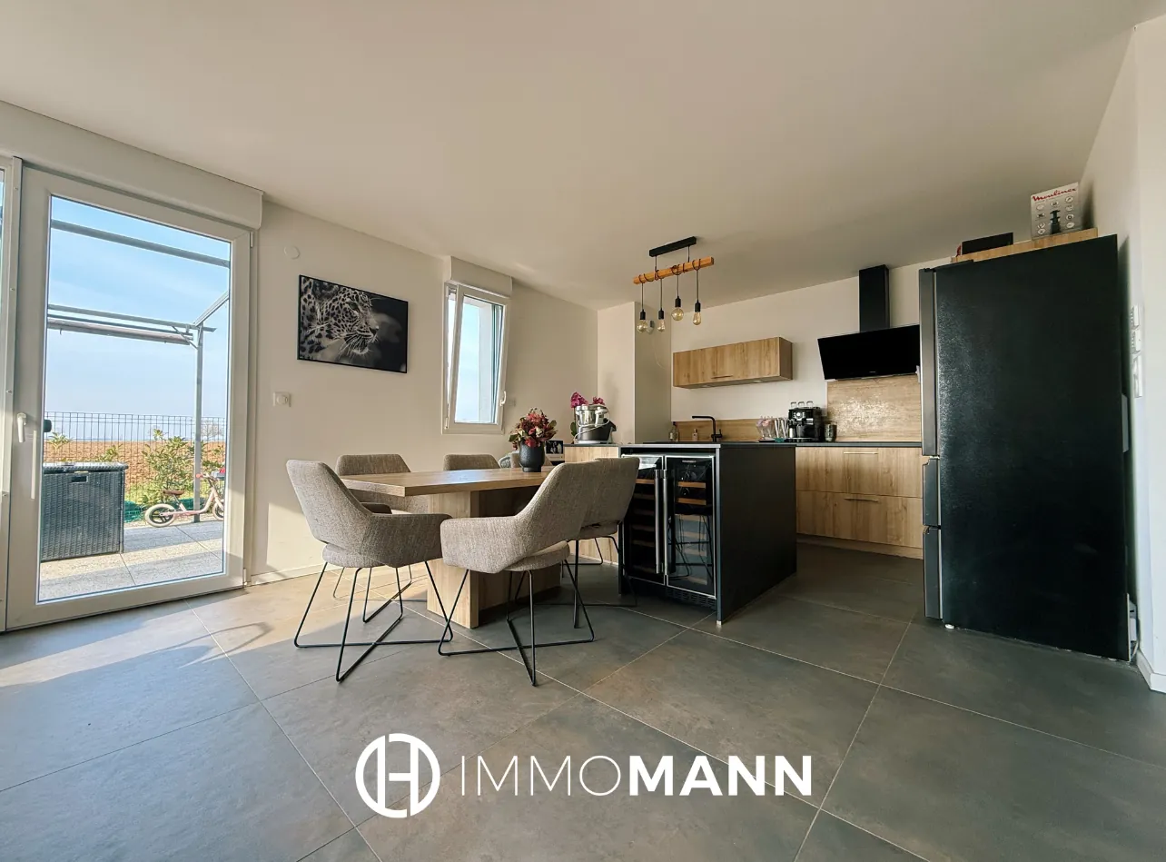 Superbe appartement en rez-de-jardin à Entzheim avec jardin privé de 129 m2 