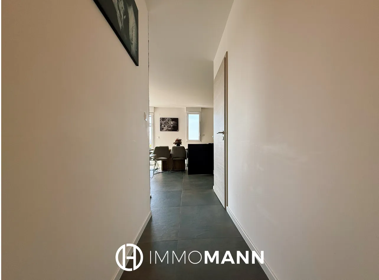 Superbe appartement en rez-de-jardin à Entzheim avec jardin privé de 129 m2 