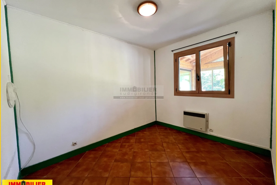 Achat maison chalet en bois à Saint-Michel de Rieufret avec garage et terrain clos 