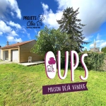 Maison de ville à vendre à Les Achards avec jardin, garage et potentiel de rénovation