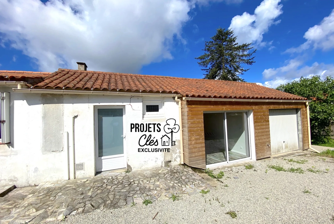 Maison de ville à vendre à Les Achards avec jardin, garage et potentiel de rénovation 