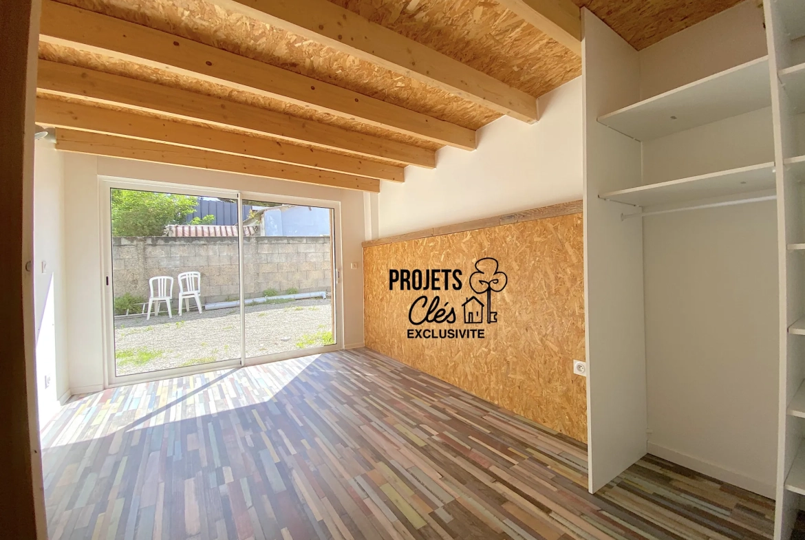 Maison de ville à vendre à Les Achards avec jardin, garage et potentiel de rénovation 