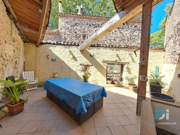 Maison de village de 77 m² avec terrasse et potentiel à Saint-Thibéry