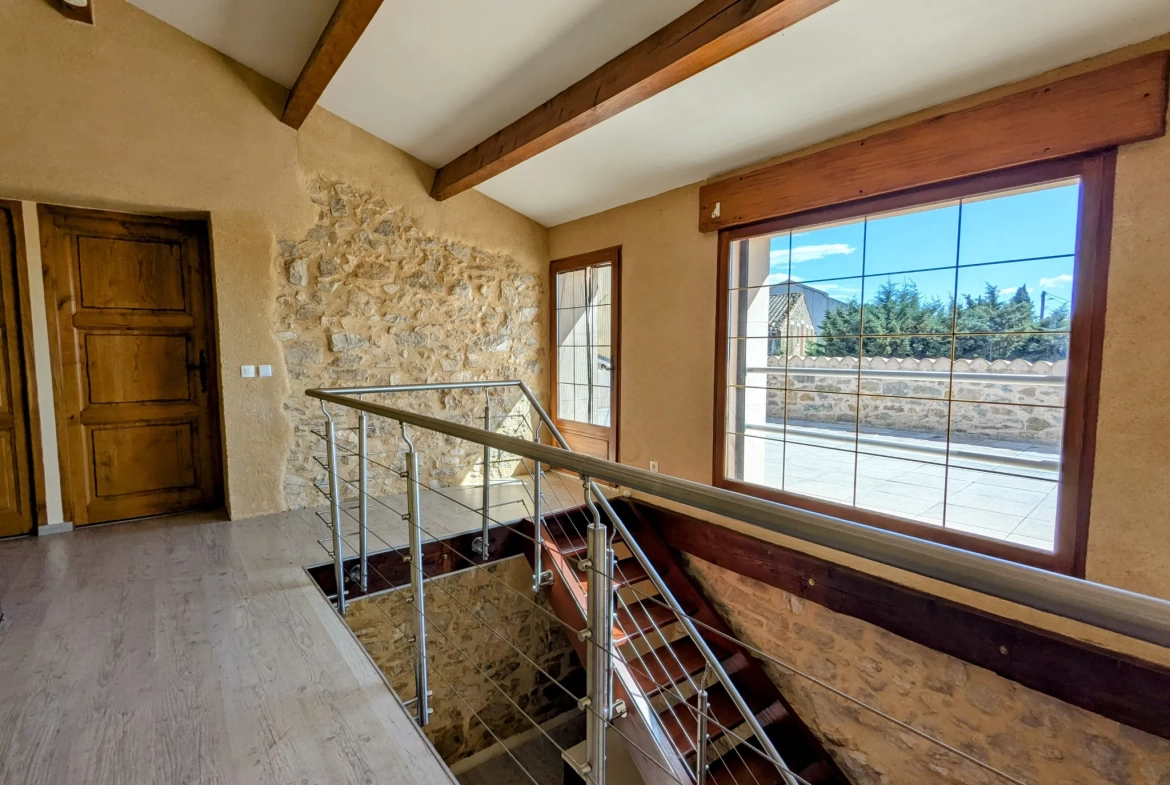 Maison authentique à Aigues Vives avec garage, jardin et terrasse exposée plein sud 