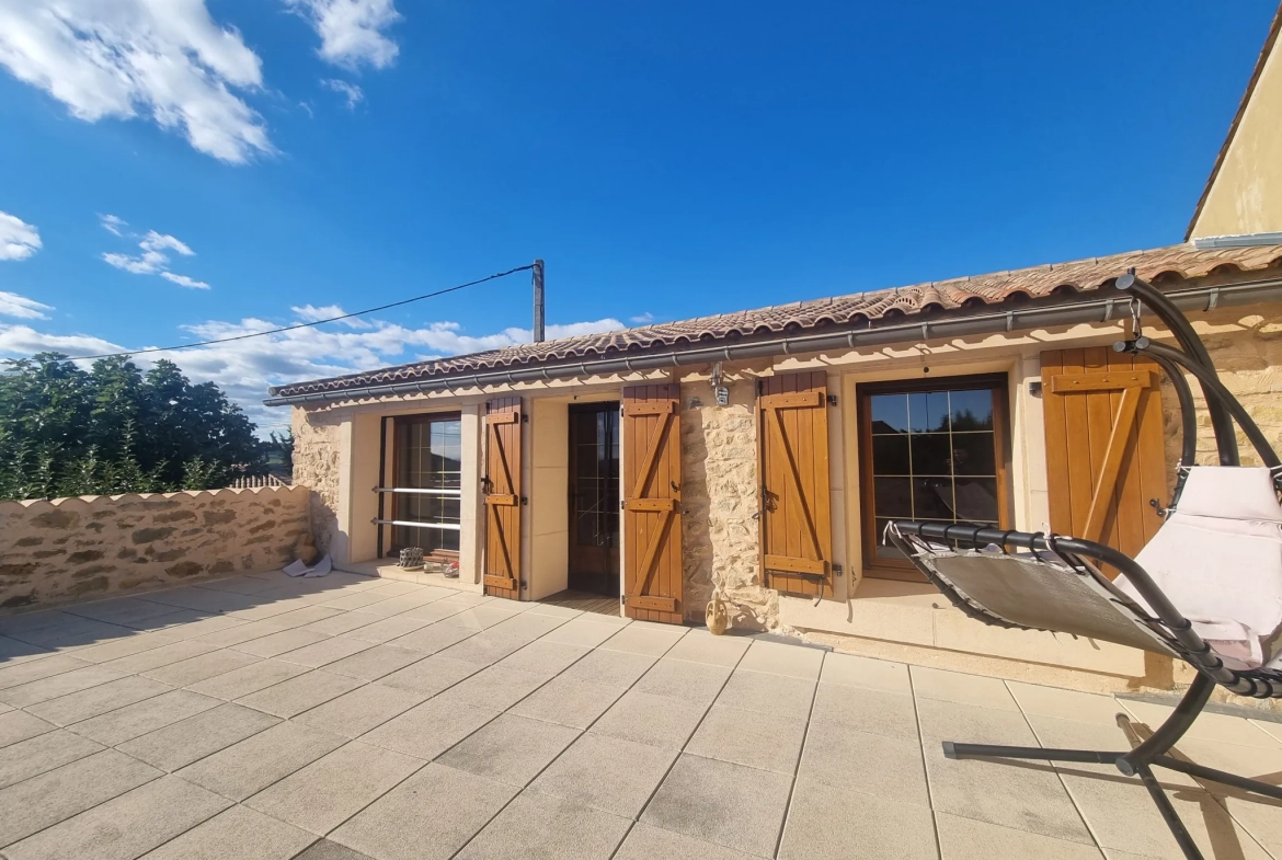 Maison authentique à Aigues Vives avec garage, jardin et terrasse exposée plein sud 