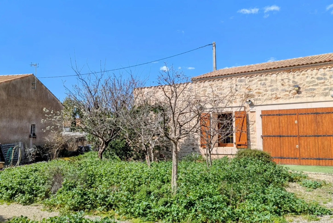 Maison authentique à Aigues Vives avec garage, jardin et terrasse exposée plein sud 