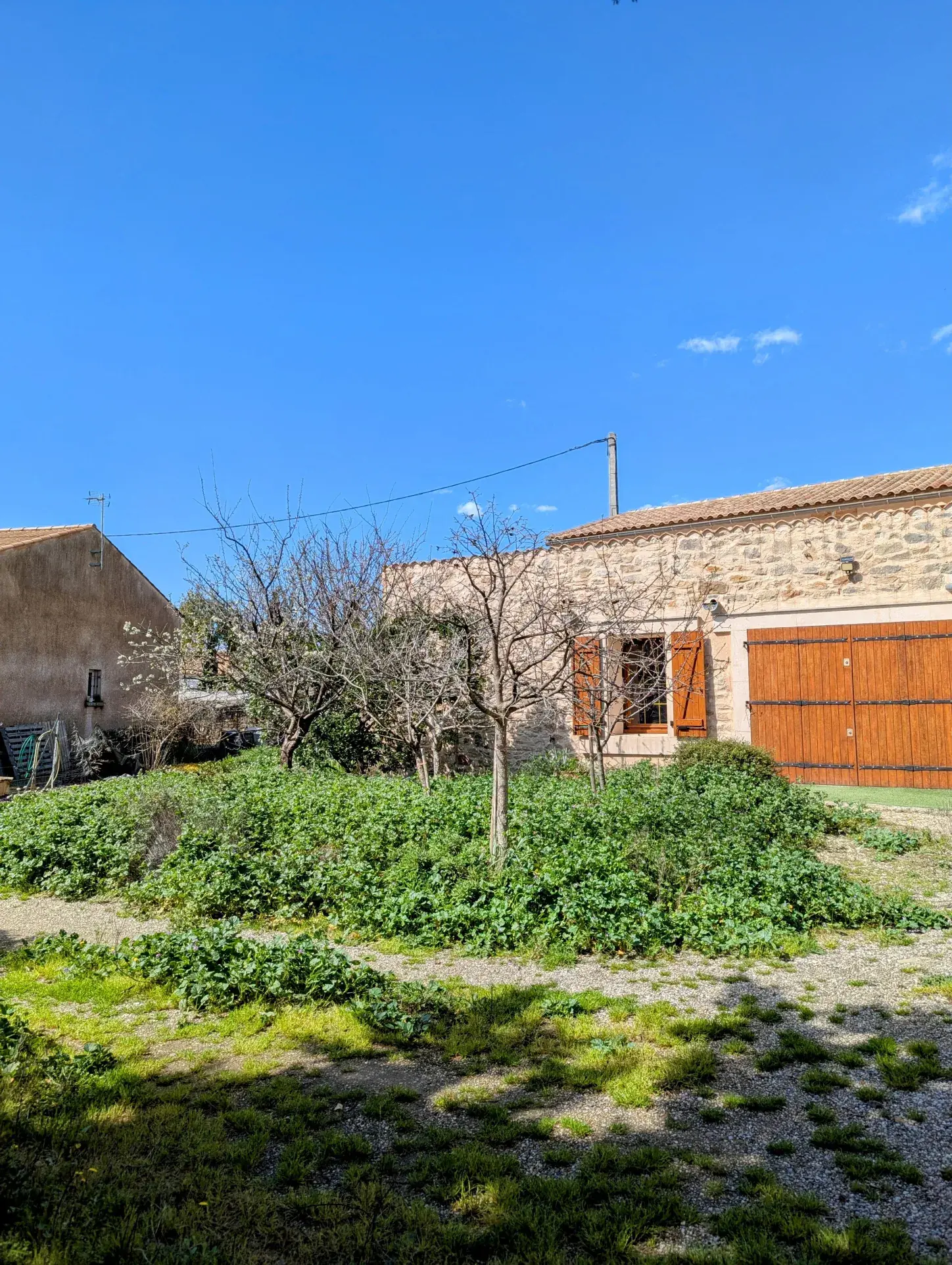 Maison authentique à Aigues Vives avec garage, jardin et terrasse exposée plein sud 