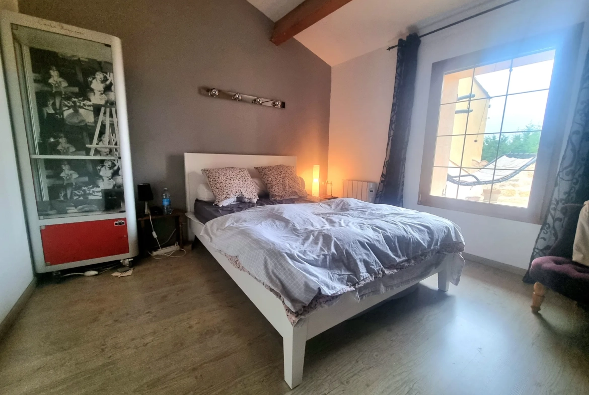 Maison authentique à Aigues Vives avec garage, jardin et terrasse exposée plein sud 