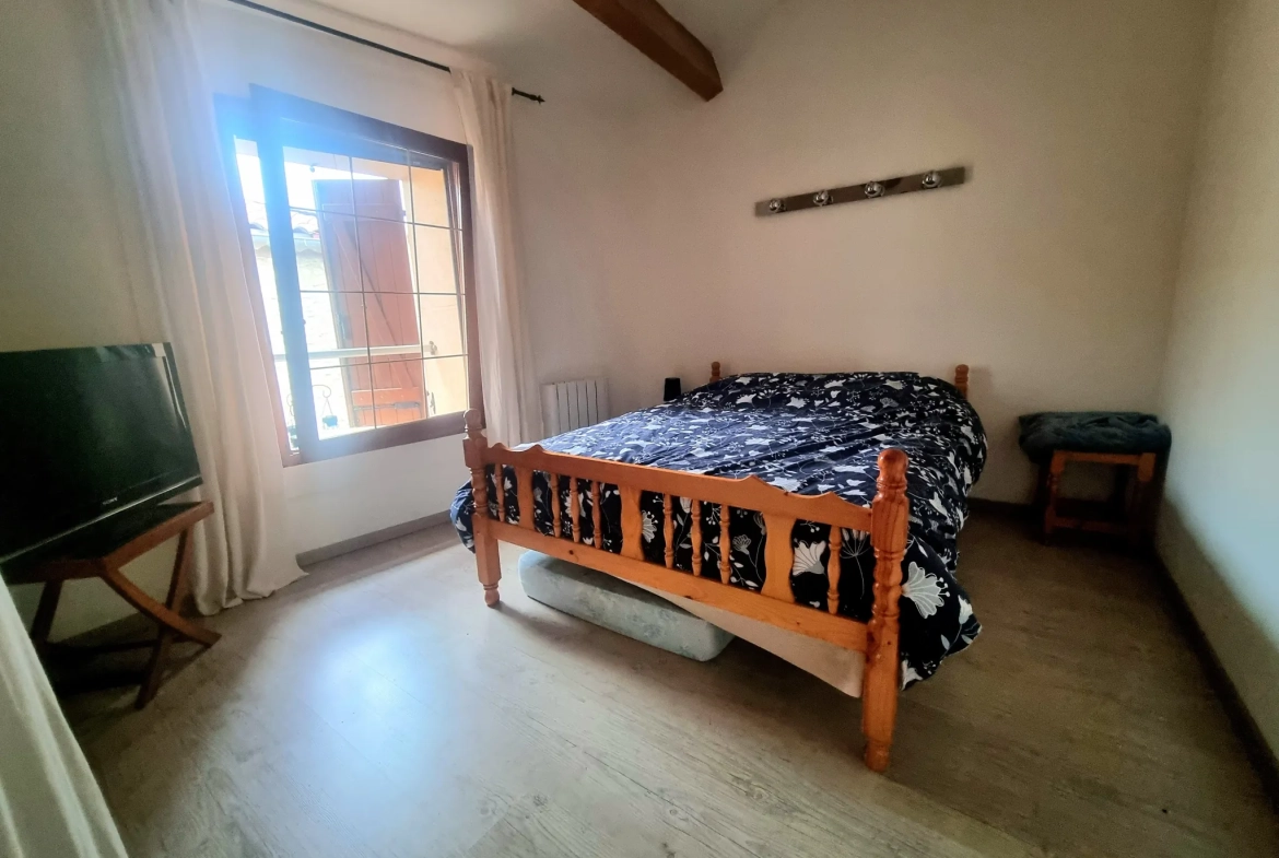 Maison authentique à Aigues Vives avec garage, jardin et terrasse exposée plein sud 
