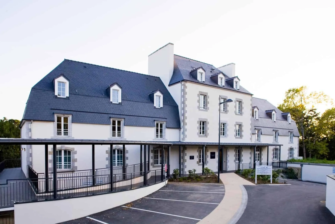 Investissement en bail commercial à Pont-Aven - Appartement de 26 m² avec terrasse et parking 