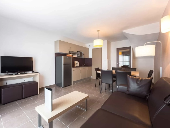 Investissement en bail commercial à Pont-Aven - Appartement de 26 m² avec terrasse et parking