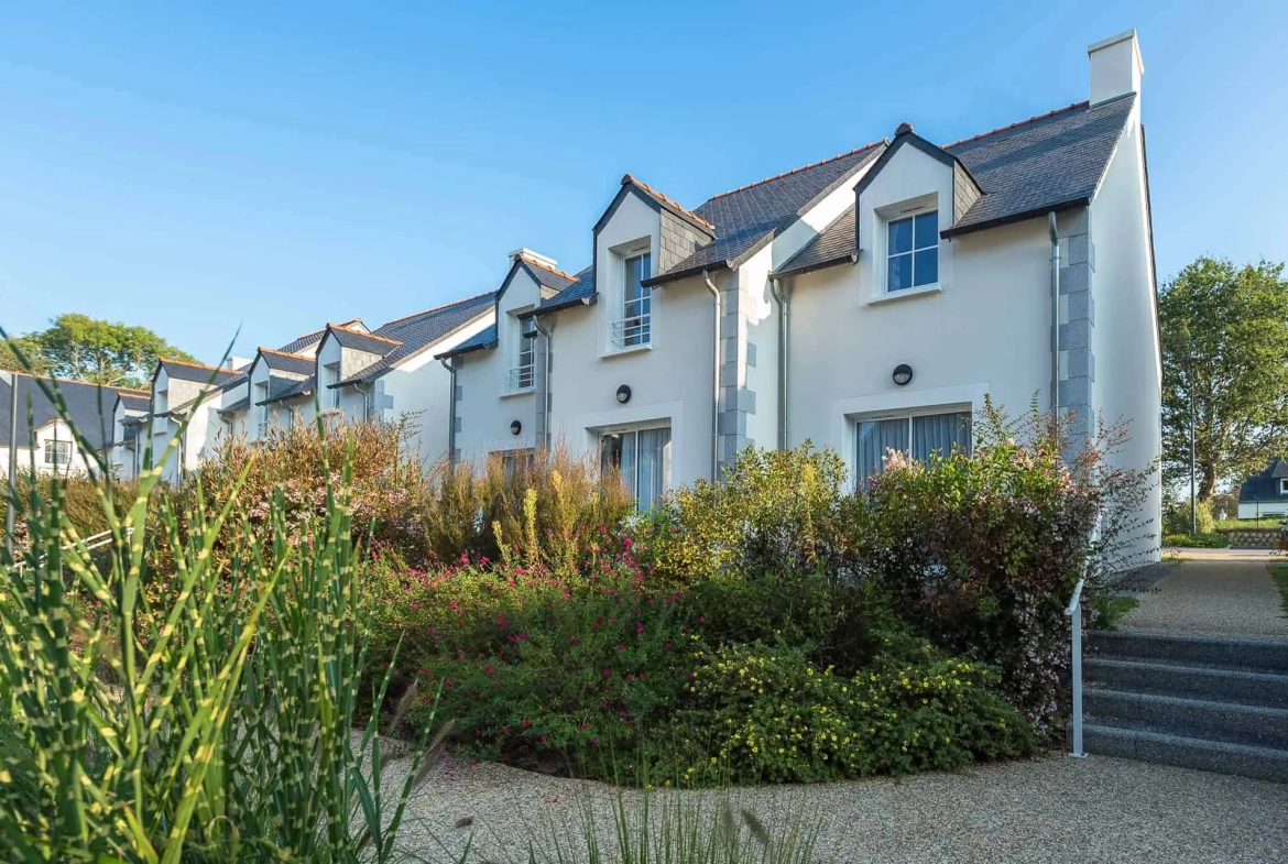 Investissement en bail commercial à Pont-Aven - Appartement de 26 m² avec terrasse et parking 