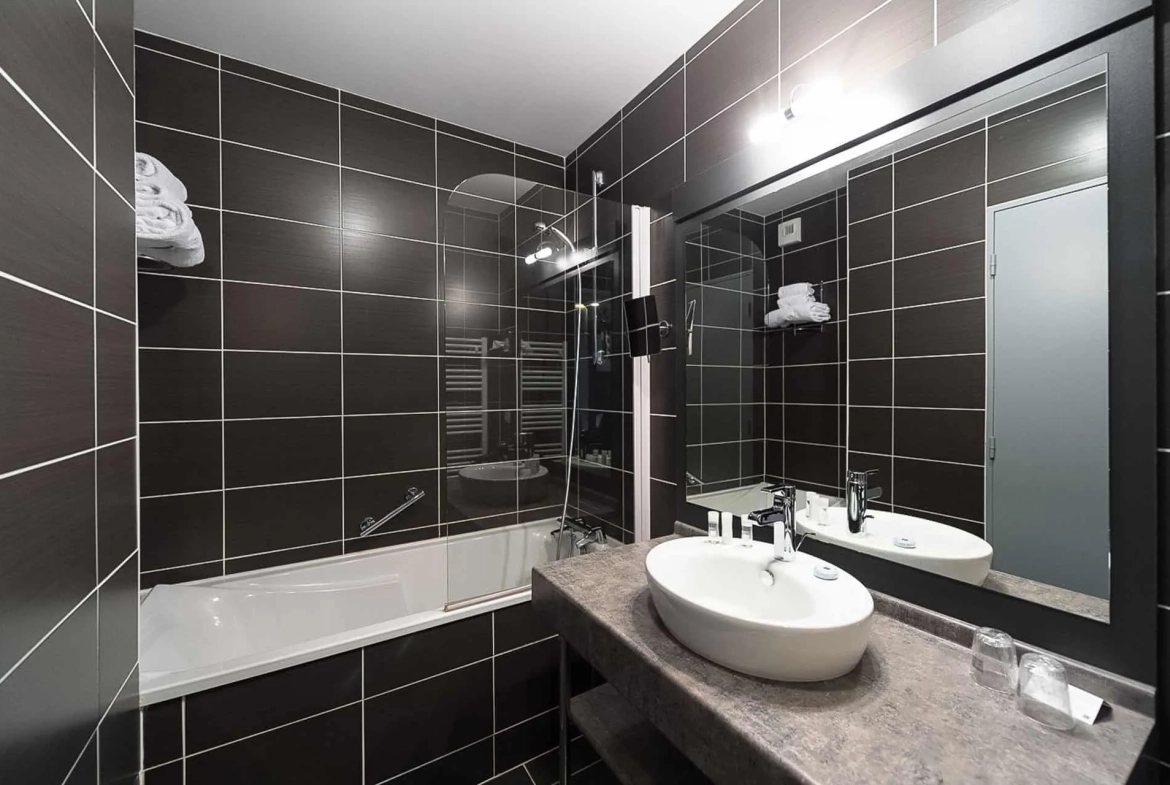 Investissement en bail commercial à Pont-Aven - Appartement de 26 m² avec terrasse et parking 