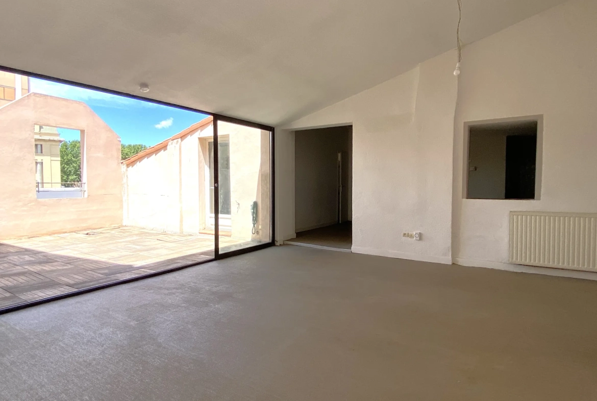 Appartement atypique avec terrasse au dernier étage à Perpignan en centre-ville 