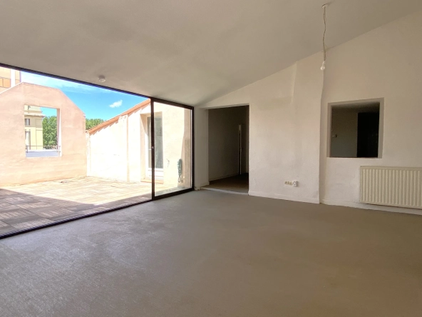Appartement atypique avec terrasse au dernier étage à Perpignan en centre-ville