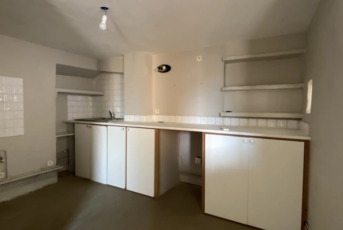 Appartement atypique avec terrasse au dernier étage à Perpignan en centre-ville 