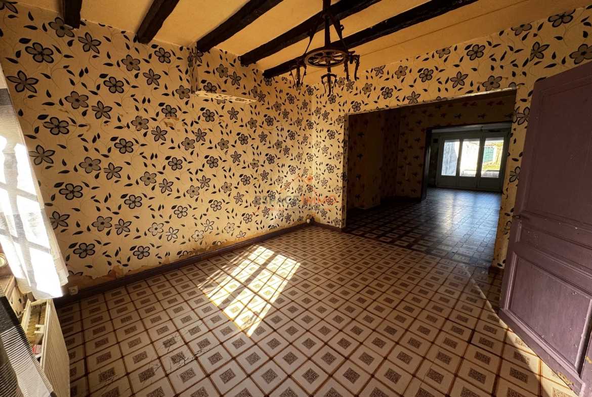 Maison à rénover à Denain avec jardin, cave et 2 chambres 