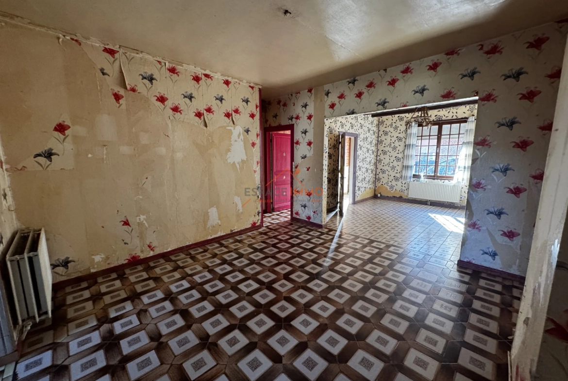 Maison à rénover à Denain avec jardin, cave et 2 chambres 
