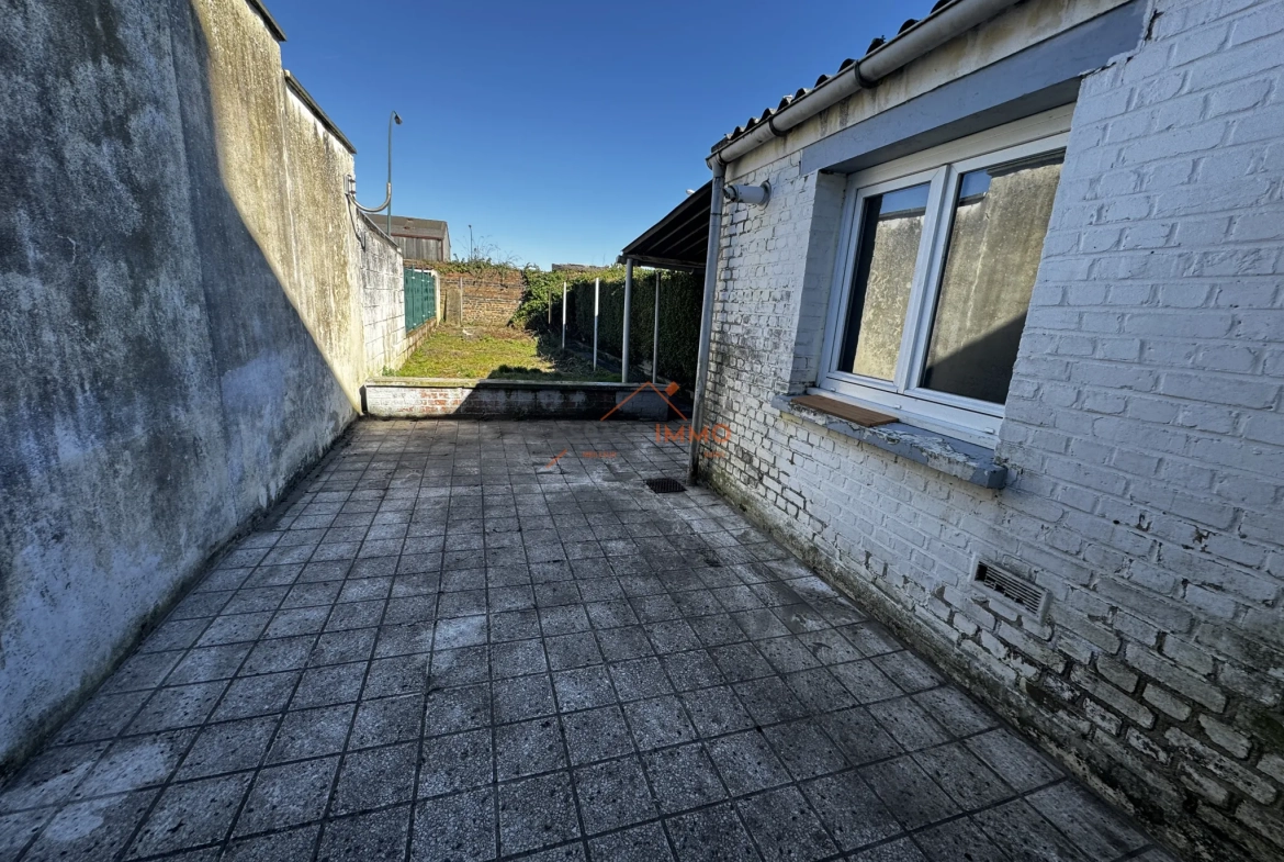 Maison à rénover à Denain avec jardin, cave et 2 chambres 