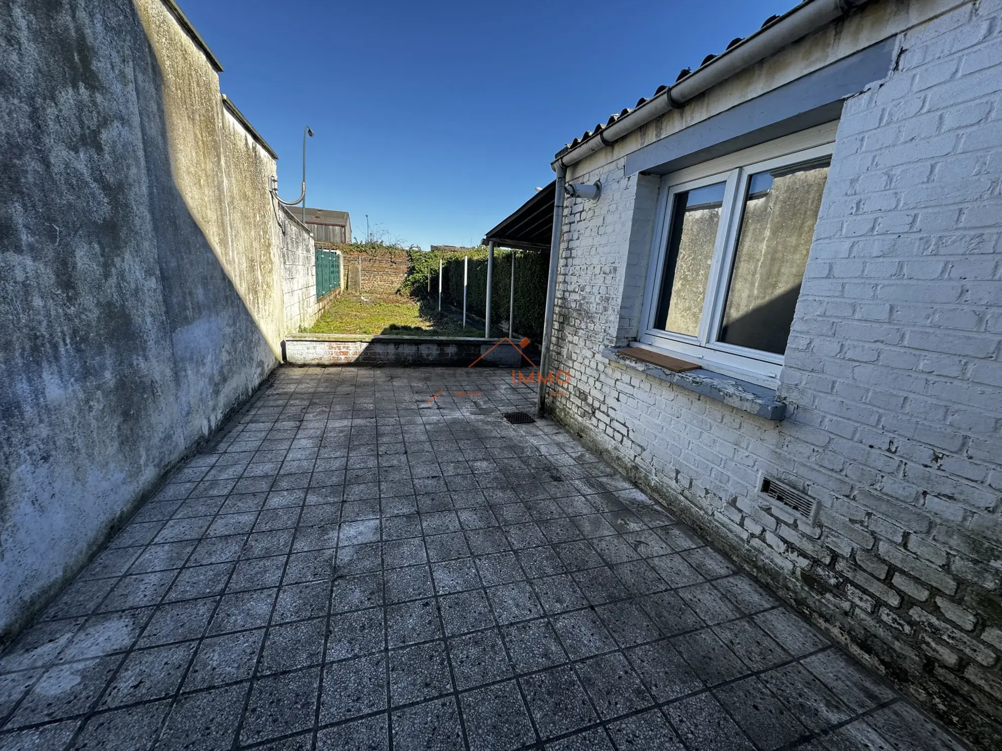 Maison à rénover à Denain avec jardin, cave et 2 chambres 