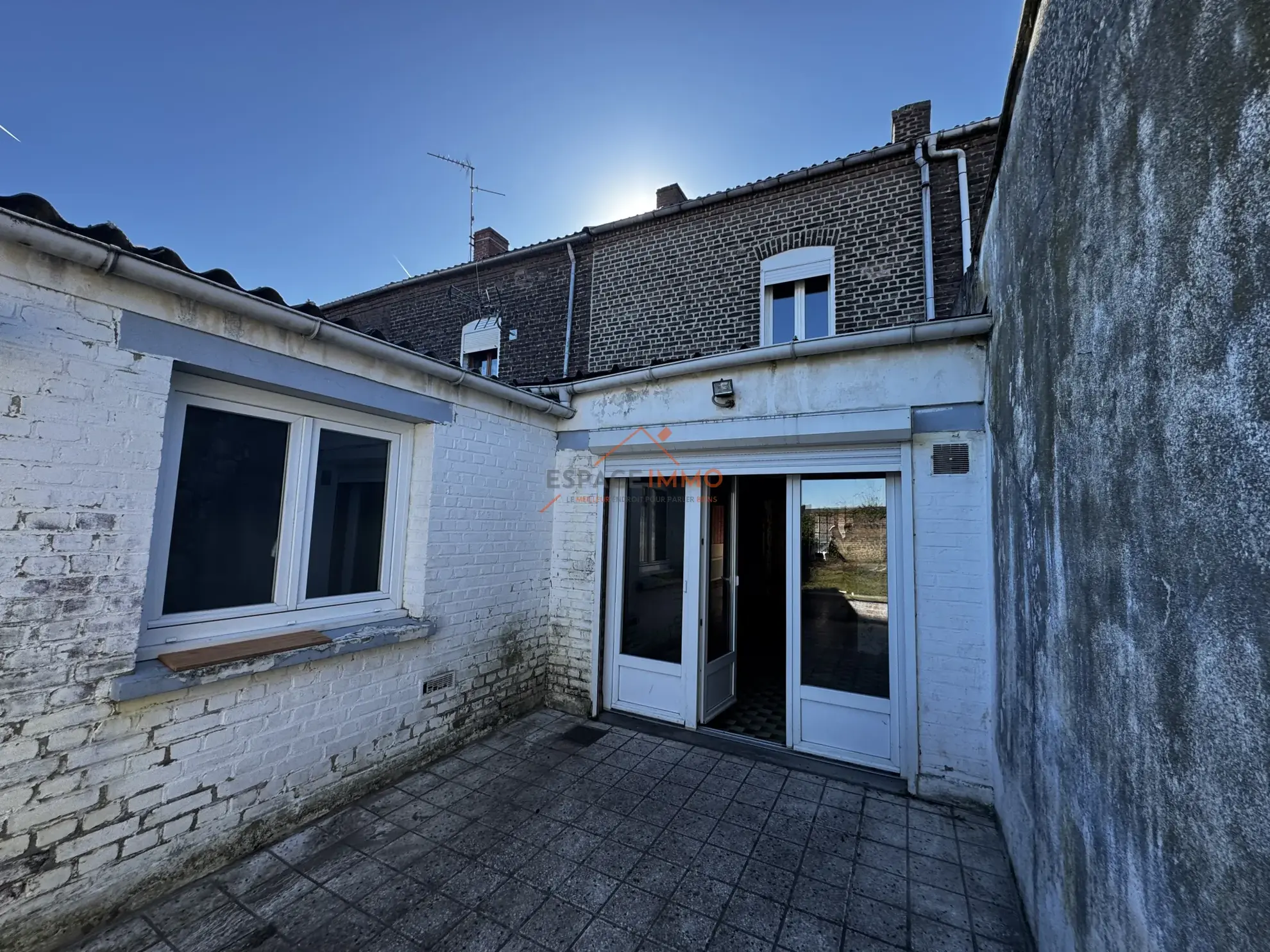 Maison à rénover à Denain avec jardin, cave et 2 chambres 